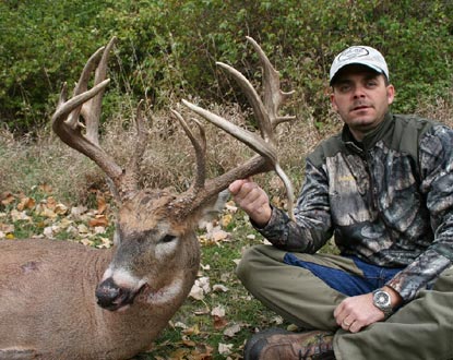 A man holding a deer